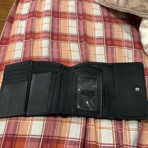 Nine W. woman’s wallet